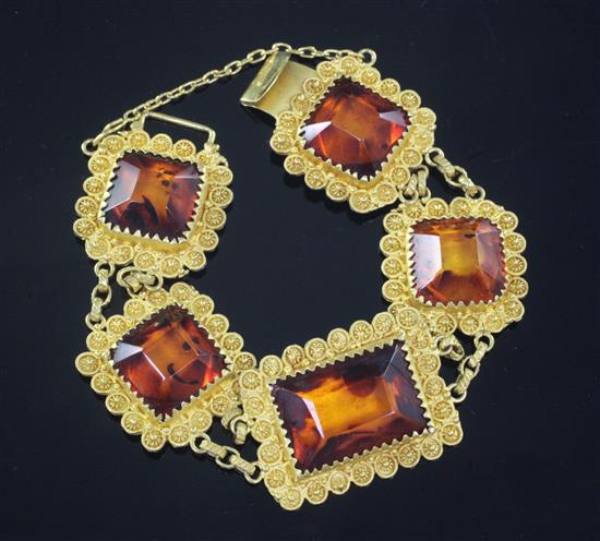 An Indian yellow metal and amber set cannetile work bracelet.